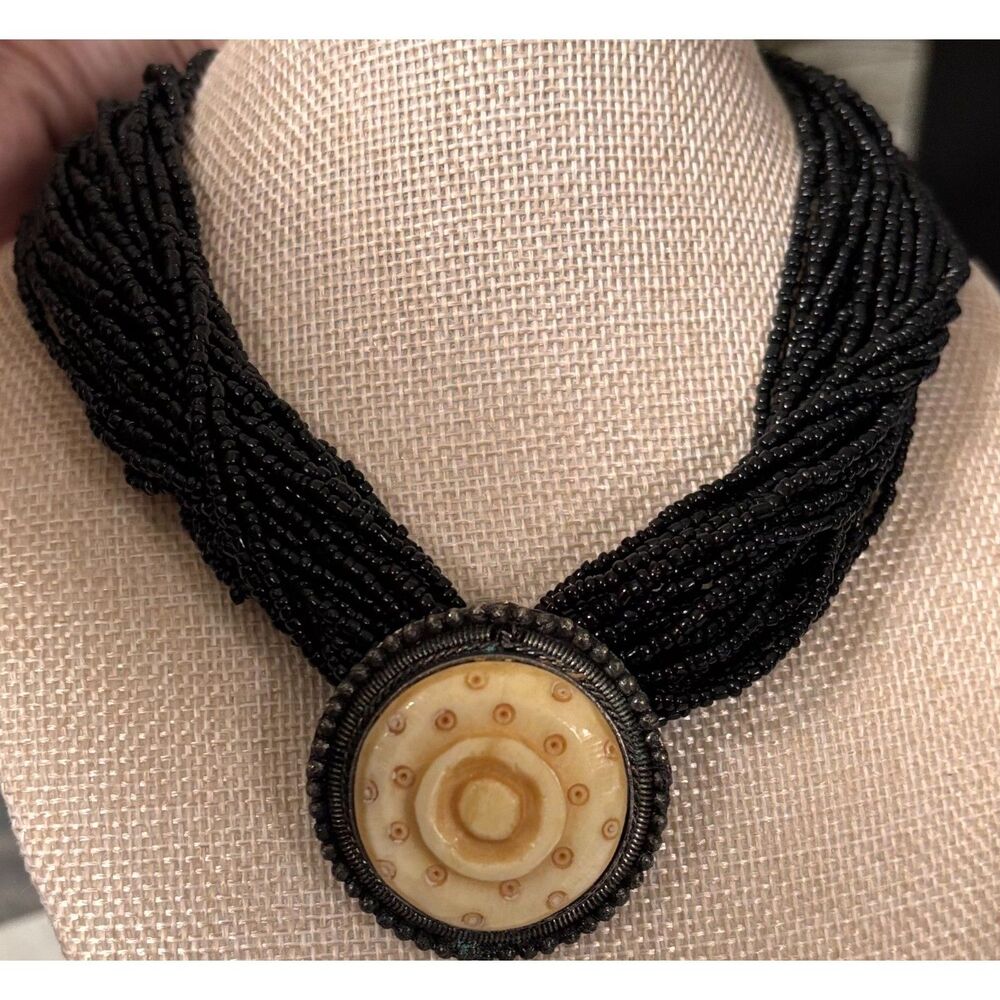 Vintage Multi-Strand Black Bead Necklace with Carved Tribal Pendant